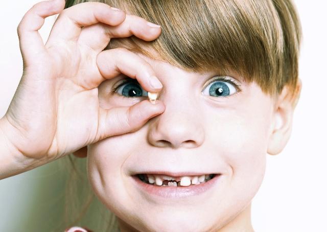 周公解梦梦见牙齿掉了好多颗并吐出来了 没有流血