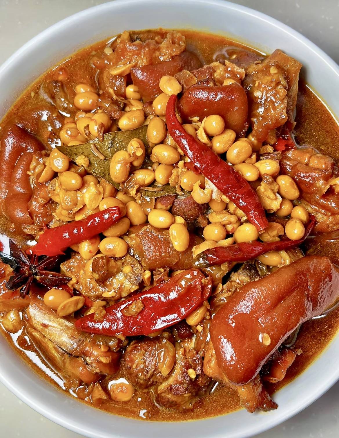 高压锅猪脚焖黄豆的做法